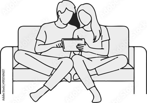Couple relaxing on sofa, engaged with a digital tablet device