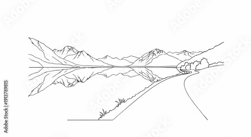 Serene mountain panorama reflected in calm water, with a winding path