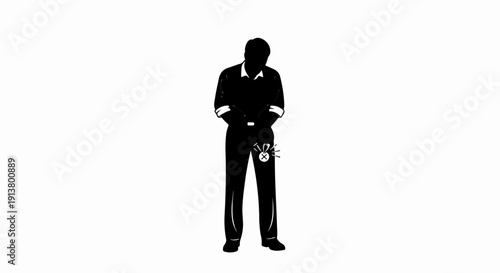 Silhouette of person with a glowing medallion on leg