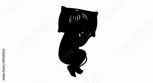 Silhouette of a sleeping child embracing a pillow