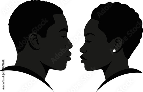 Silhouettes of a couple facing each other, about to kiss