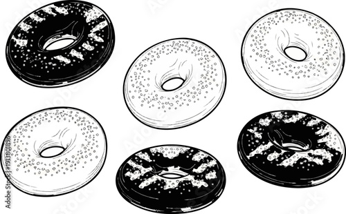 Six round baked goods with holes, some dark, some light, adorned with sprinkles