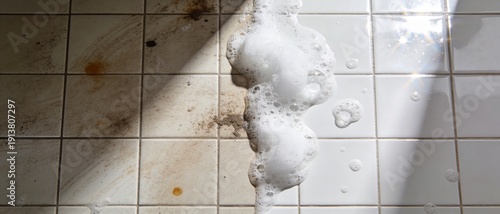 Panel kuchenny z motywem White square tiles half covered with dirt, grime, bubbles and clean shining part. Before after cleaning concept for household, spring cleaning.