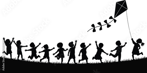 A cheerful group of children run playfully on green grass reaching for a flying kite in the sky