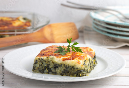 Baked Spinach with cheese d...