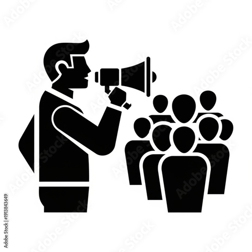 Man using megaphone to address a crowd of people.