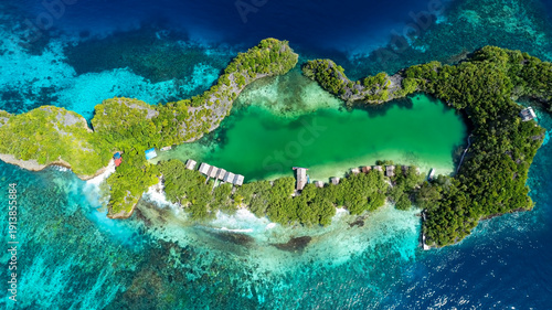 Aerial view with the green island with  turquoise hues of Raja Ampat