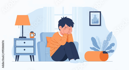 Person sitting in a chair, covering face with hands in distress