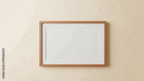 Simple wooden frame with a blank white mat on a textured tan wall background