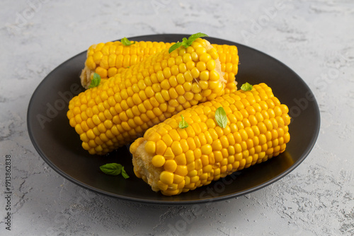 Sweet boiled corn, food con...