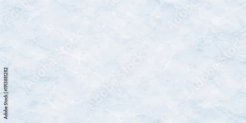 Abstract blue winter background featuring a bright sky texture with frozen snowflakes and white frost patterns in a cold nature season