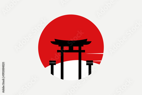 Japanese torii gate in front of a rising sun