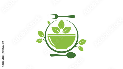 Healthy organic food concept shows a green bowl filled with leaves surrounded by a fork and spoon for natural diet promotion.