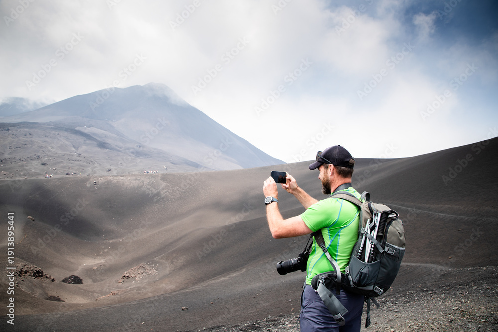 Fototapeta premium hiker trekking on mount Etna