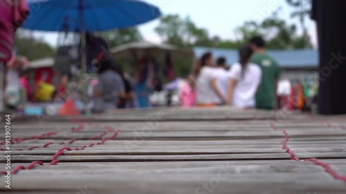 Wallpaper Mural thailand market with close up of wooden shop with custumers in the blurred background Torontodigital.ca