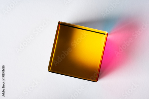 Futuristic Golden Cube with Colored Light Shadow Modern Concept