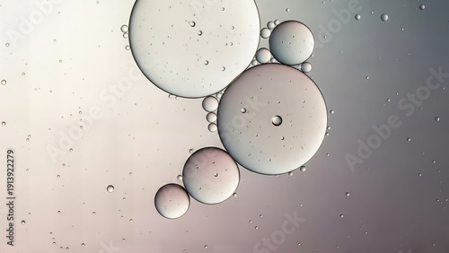 Cool Grey Pink Abstract Background with Clear Oil Drops and Bubbles Macro