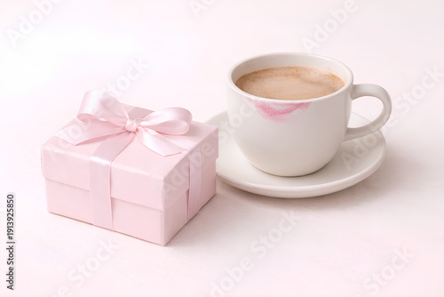 Pink Gift Box with Satin Ribbon and Coffee Cup with Lipstick Mark, Copy Space