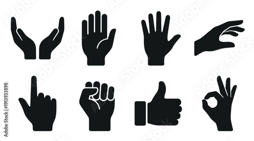 Collection of black hand gesture icons showing various signs like thumbs up, okay, stop, pointing, and a raised fist in a clean, minimalist vector graphic illustration style
