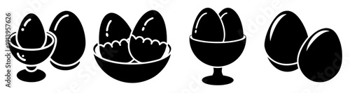 Set of six boiled eggs in black ceramic egg cups minimalist breakfast table top flat lay dark background