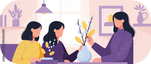 Three women arranging yellow and blue floral branches in a vase