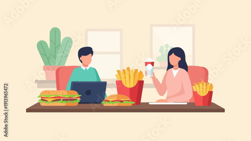 Two people enjoy fast food while working at desks with laptops