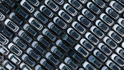 Obraz na płótnie Aerial view car for sale stock lot row, Cars dealership inventory distribution automobile and automotive business, New cars parking for sale automobile automotive industry business