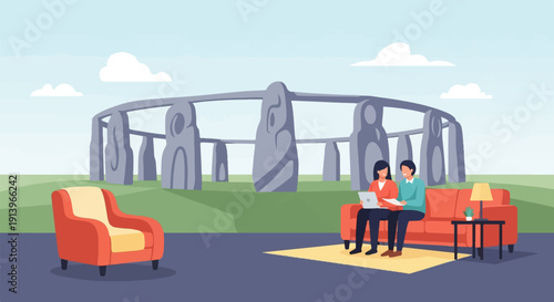 Two people relax on a couch in front of ancient stone monument