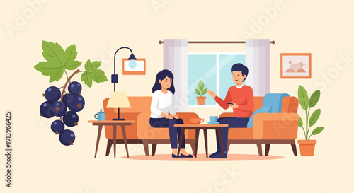 Two people in a living room, with a sprig of blackcurrants nearby