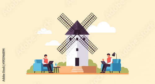 Two people working on laptops by a windmill on a sunny day