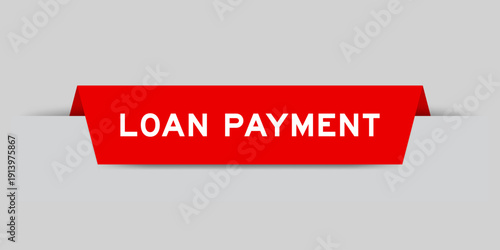 Red color inserted label with word loan payment on gray background