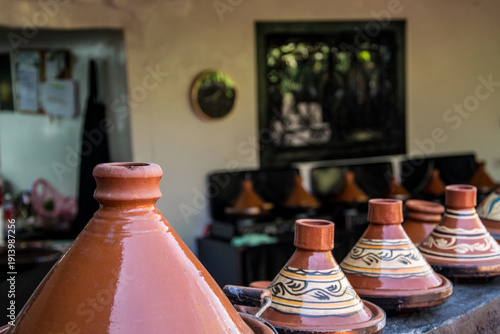 Traditional Moroccan kitchen with tajines and colorful cookware