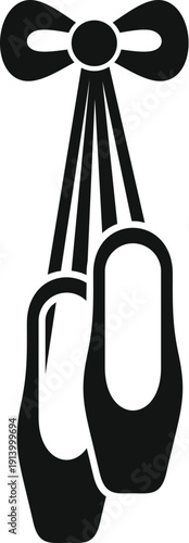 Ballet pointe shoes hanging from a ribbon as a dance symbol