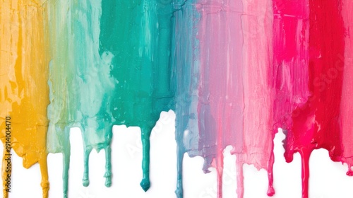 Colorful paint drips on a white background in a creative space setup