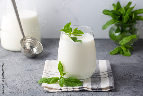 Photos Glass cup of Turkish traditional drink ayran , kefir or buttermilk made from yog