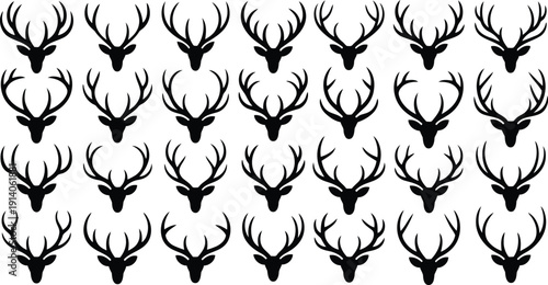 Many black deer stag head silhouettes with prominent antlers creating a repeating pattern on white