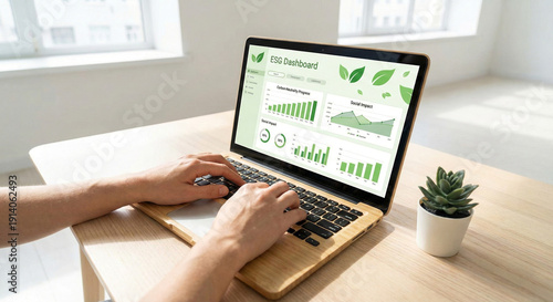 Person typing on laptop with esg dashboard showing environmental, social, and governance progress and data