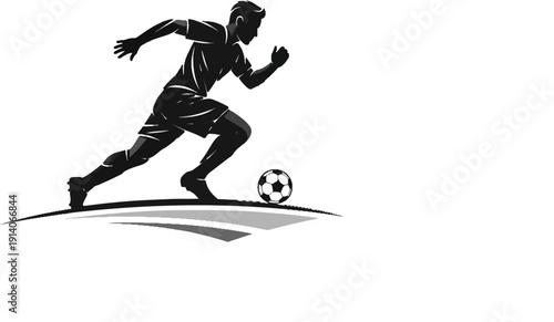 Silhouette of a soccer player dribbling a ball while running