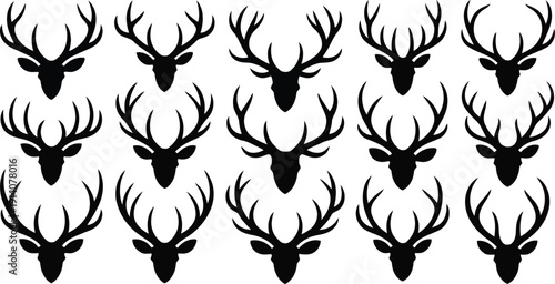Repeated pattern of black reindeer heads with impressive antlers on white