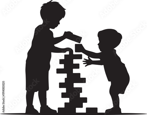 Two children building a block tower together in silhouette