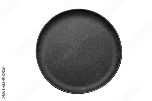 Top view of empty black cast iron round griddle pan isolated on white background.