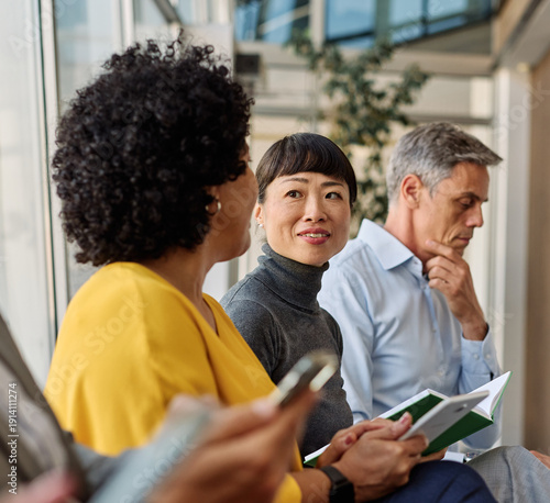 Wallpaper Mural Portrait of a businesspeople sitting in chair and waiting for an interview for job application using a laptop and phone Torontodigital.ca