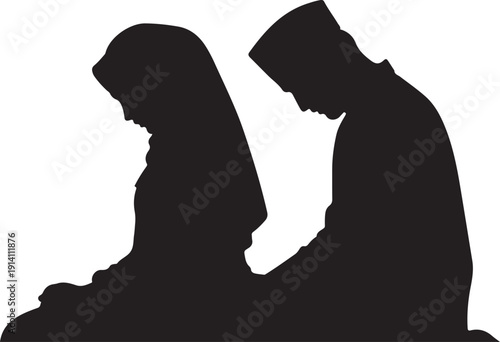 Silhouette of two people praying together in profile view