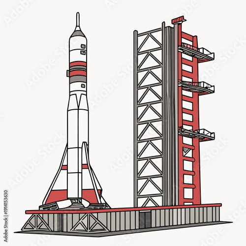 White and red rocket on launchpad with service tower