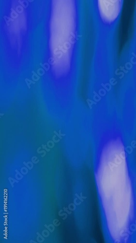 Vibrant Vertical Light Leak Bokeh Transition, a stunning visual effect with glowing blue and white circles, perfect for dynamic intros.