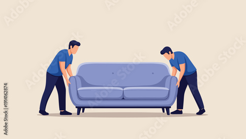 Two professional movers in blue uniforms carefully carrying a large blue sofa during a residential house relocation.