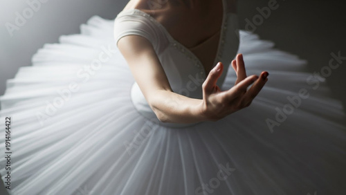 Elegant Ballerina in White Tutu Posing Gracefully, Artistic Dance Performance.