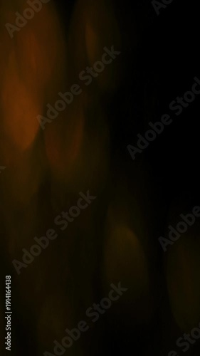 Dynamic Vertical Light Leak Bokeh Transition with vibrant orange and pink hues, perfect for creative projects.