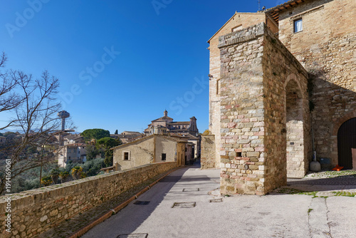 Wallpaper Mural A street among the old stone houses of Montefalco, a medieval village in the Umbria region, Italy. Torontodigital.ca