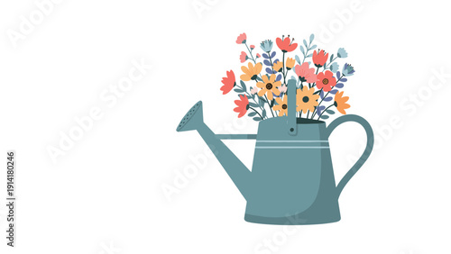 Beautiful blue watering can filled with a large bouquet of colorful spring flowers including red orange and yellow blossoms for gardening.